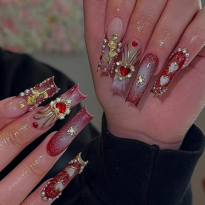 Exquisite artificial nails with glamorous decorations Stornfield