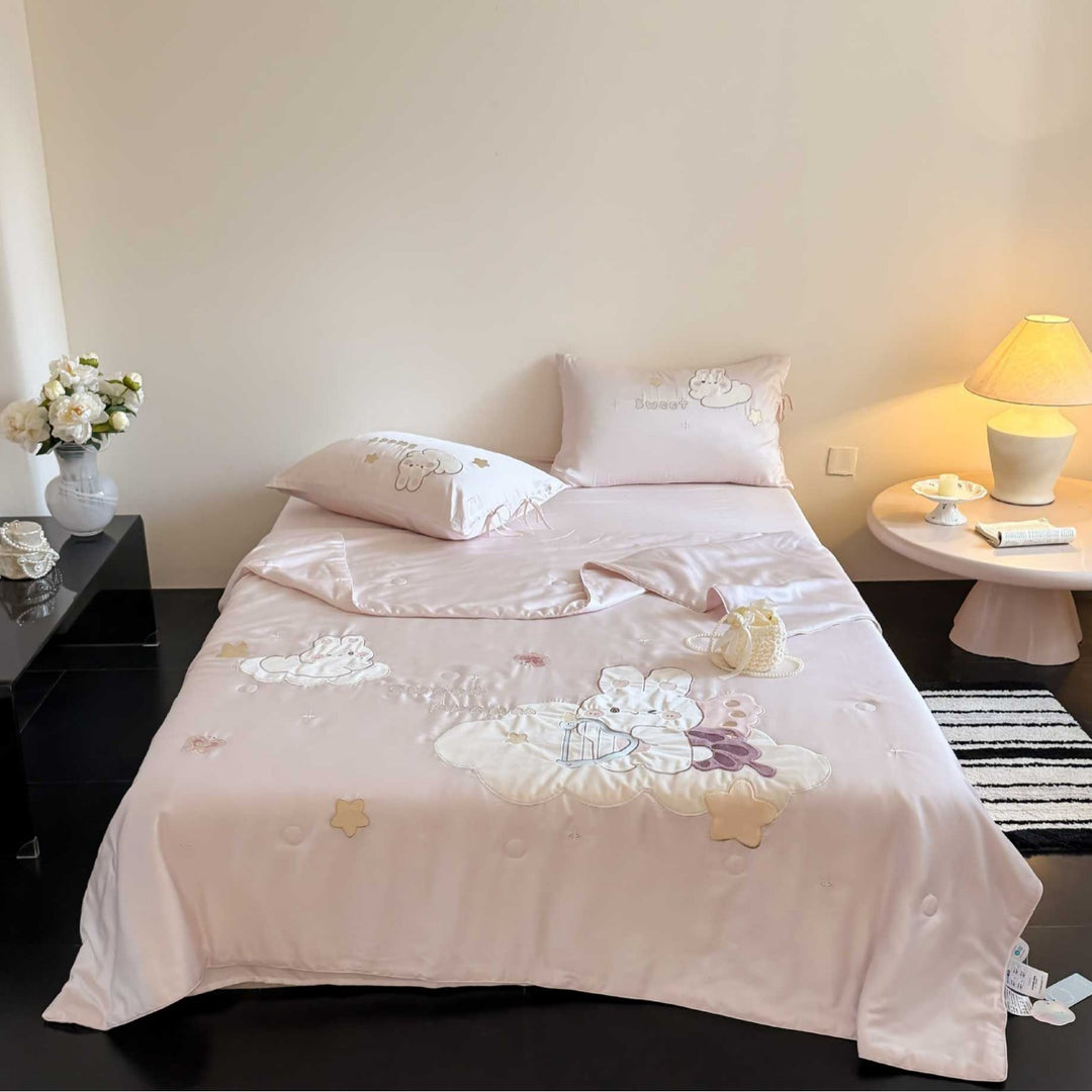 Cotton satin children's bedding set with embroidered cloud and animal appliqués