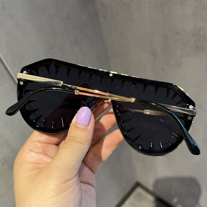 Ladies extravagantly designed cat-eye sunglasses with glitter accents Stornfield
