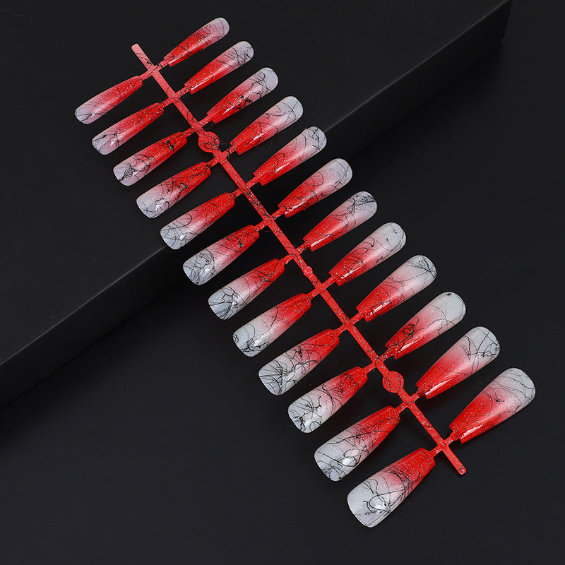 Artificial nails in modern ombre design with marbled accents Stornfield