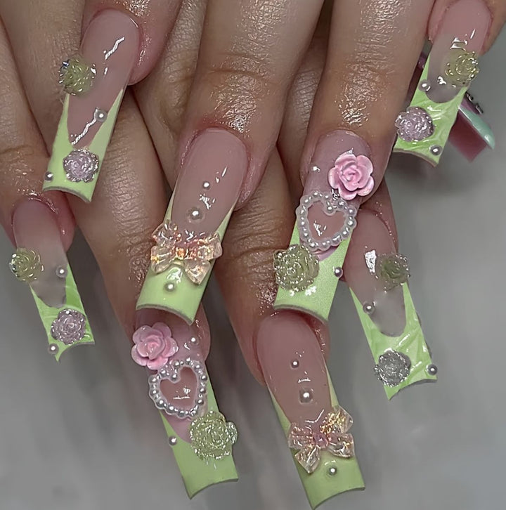 Artful artificial nails with floral and decorative accents Stornfield
