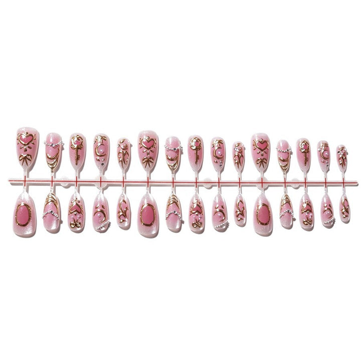 Artificial nail set with romantic decorations Stornfield