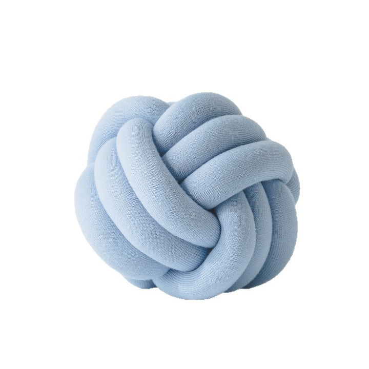 Decorative knitted knot cushion as a decorative pillow made of soft jersey