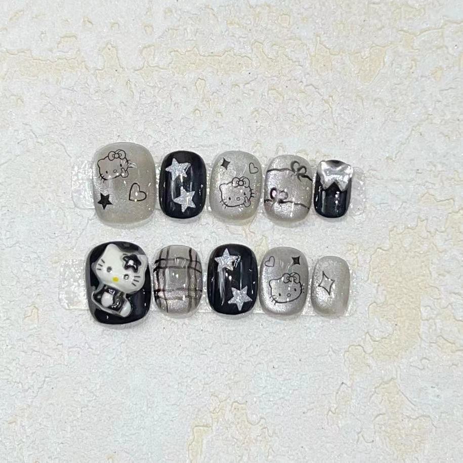 Fun and Whimsical Press-On Nail Set with Cartoon Accents Stornfield