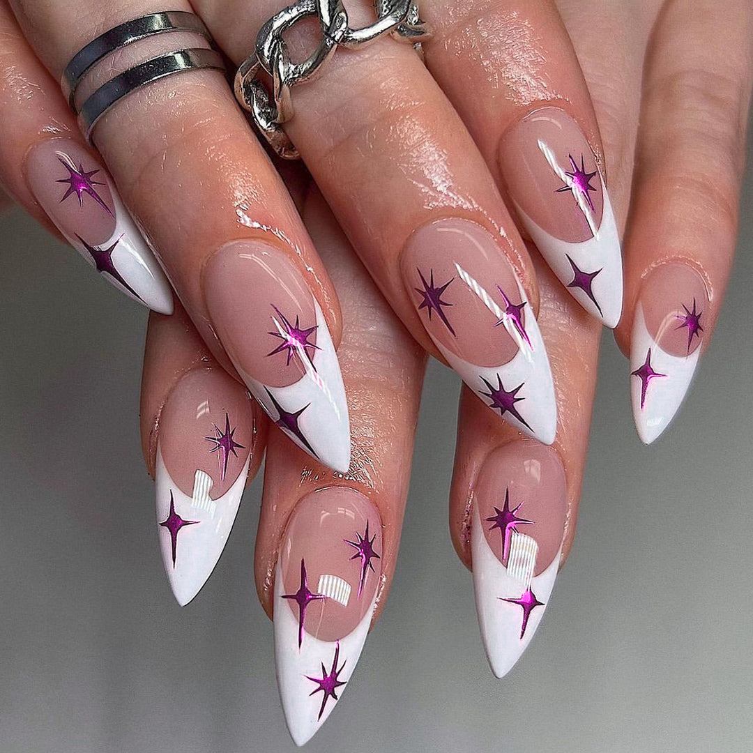 Artful stiletto nails with modern design and glitter details Stornfield