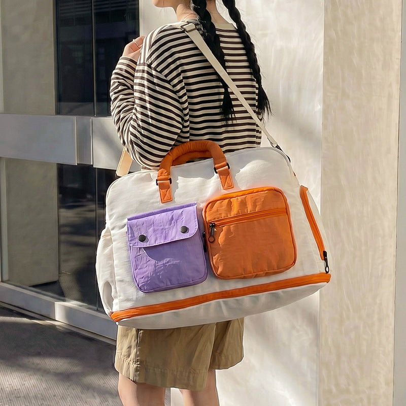 Sporty travel bag with multiple pockets and adjustable shoulder strap Stornfield