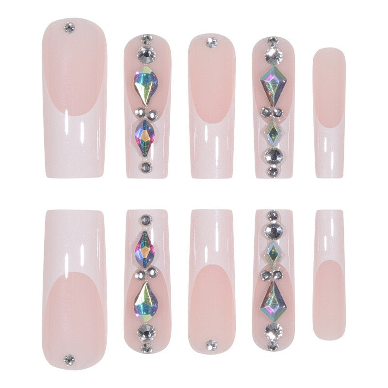 Artificial nail set with glamorous rhinestones and 3D decorations Stornfield