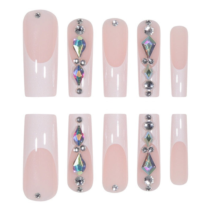 Artificial nail set with glamorous rhinestones and 3D decorations Stornfield