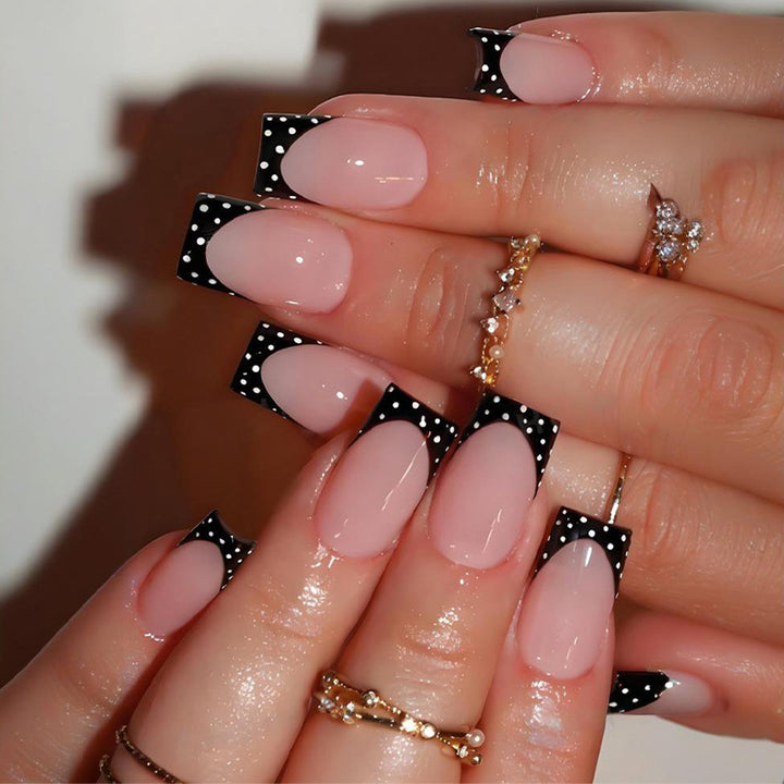 Artificial nail set with elegant black and white accents Stornfield