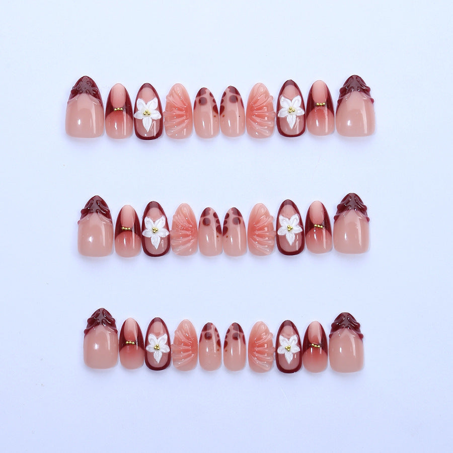Artificial nail set with floral 3D applications and elegant gradient design Stornfield