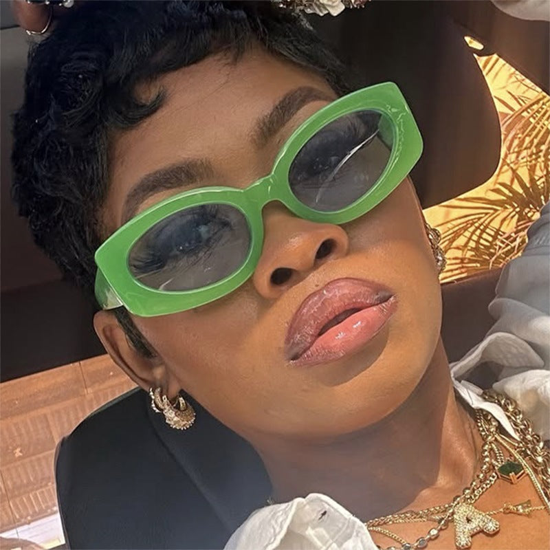 Ladies trendy sunglasses with unique, curved frame Stornfield