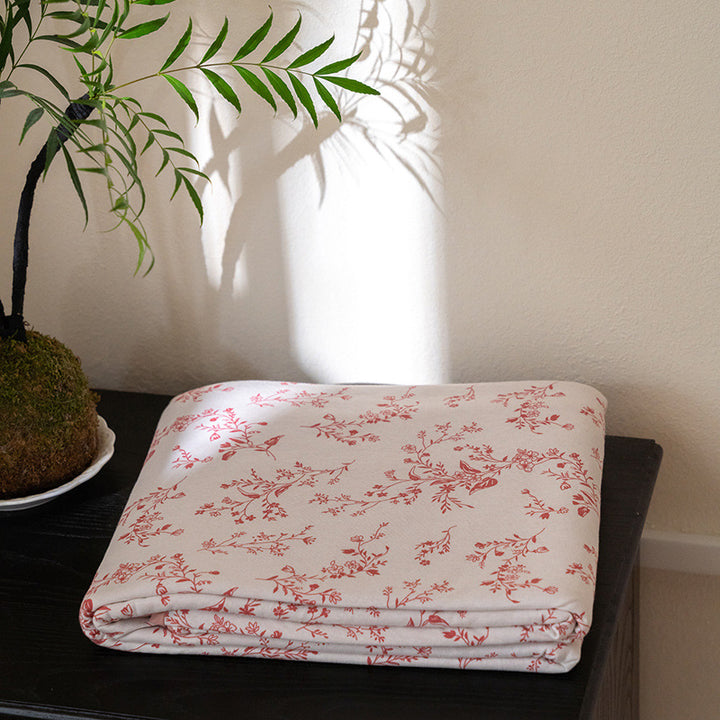 Organic Cotton Muslin Swaddle Blanket with Playful Cartoon Print