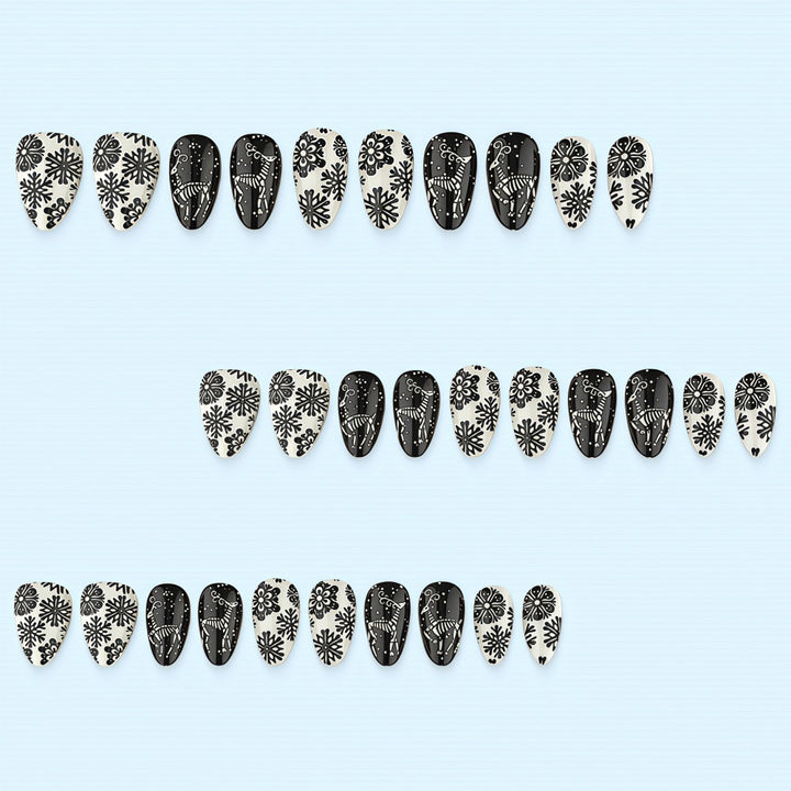 Artificial nails in a unique winter design with snow and reindeer motifs Stornfield