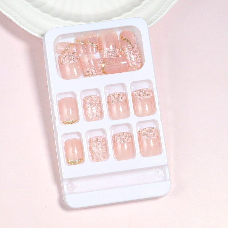 Elegant Press-On Nail Set with Gold Accent and Glitter Design Stornfield