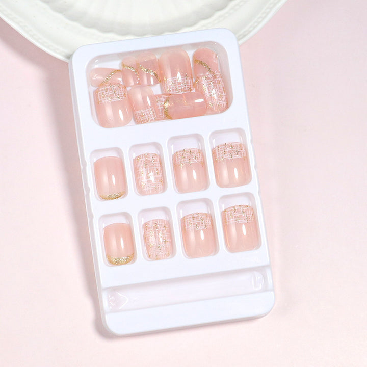 Elegant Press-On Nail Set with Gold Accent and Glitter Design Stornfield