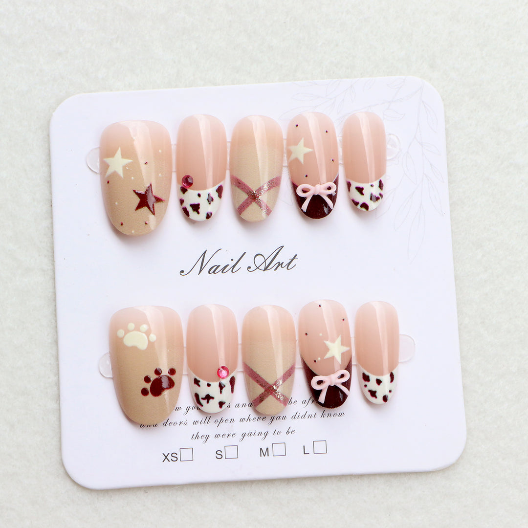 Thematic Press-On Nail Art Set with Charming Designs Stornfield