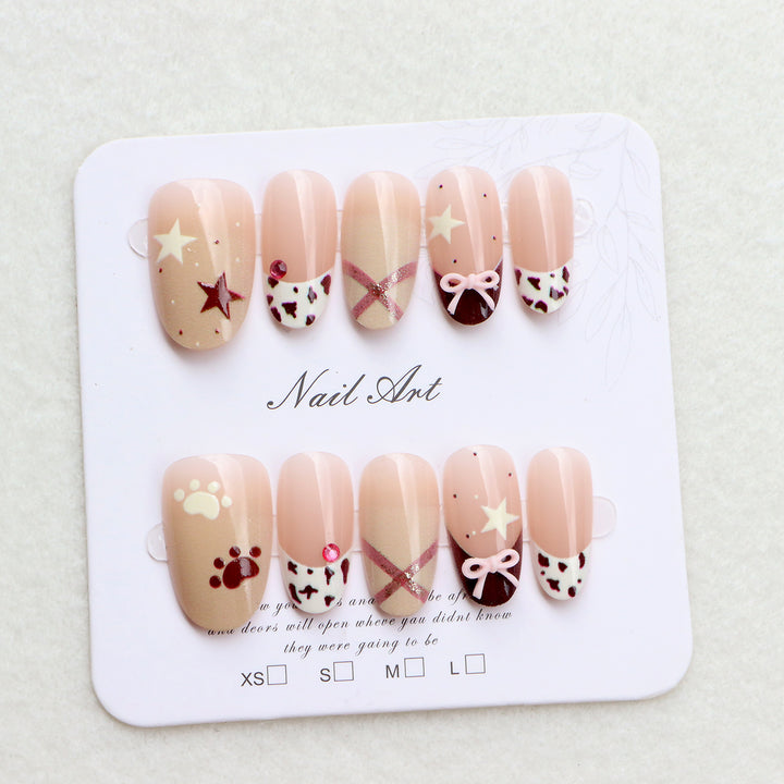 Thematic Press-On Nail Art Set with Charming Designs Stornfield