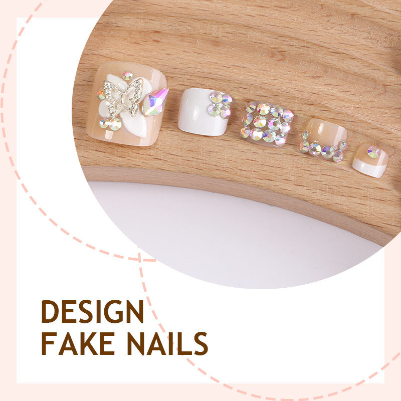 Artificial nail set with elegant butterfly accents Stornfield