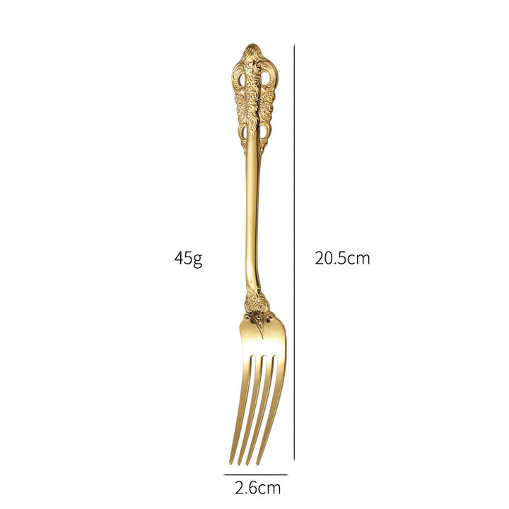 Elegant fish fork with artistic handle design Stornfield