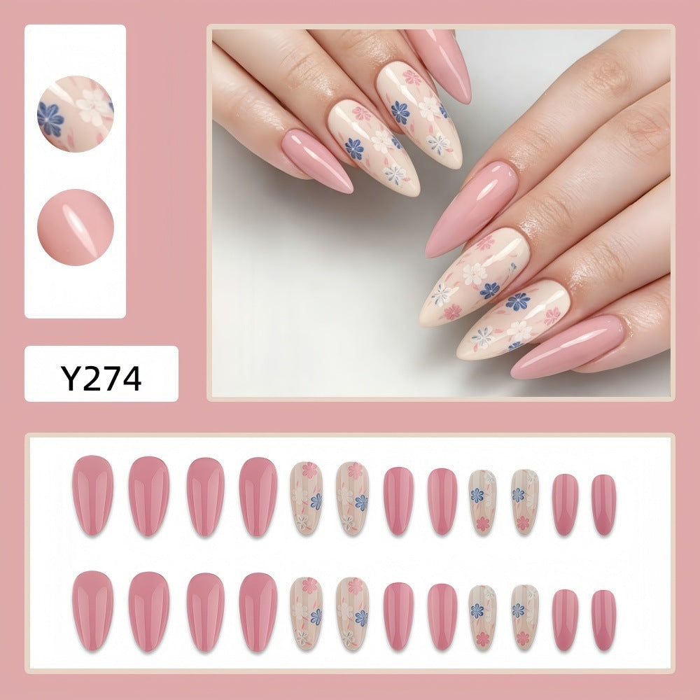 Stylish almond-shaped artificial nails with floral patterns Stornfield
