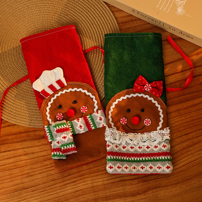 Decorative wine bottle cover in gingerbread man design Stornfield