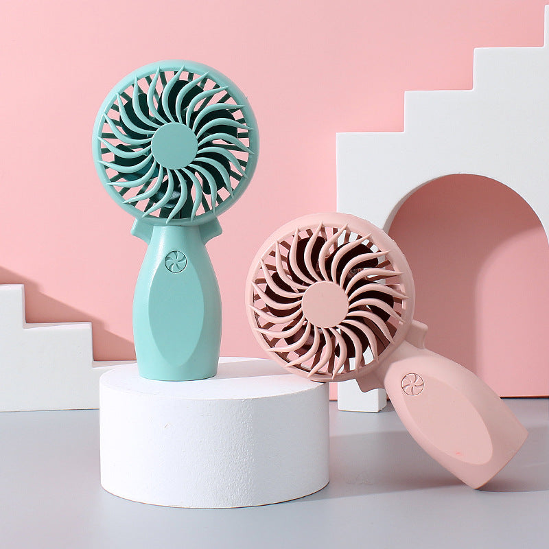 Women's portable hand fan with ergonomic grip and powerful battery technology Stornfield