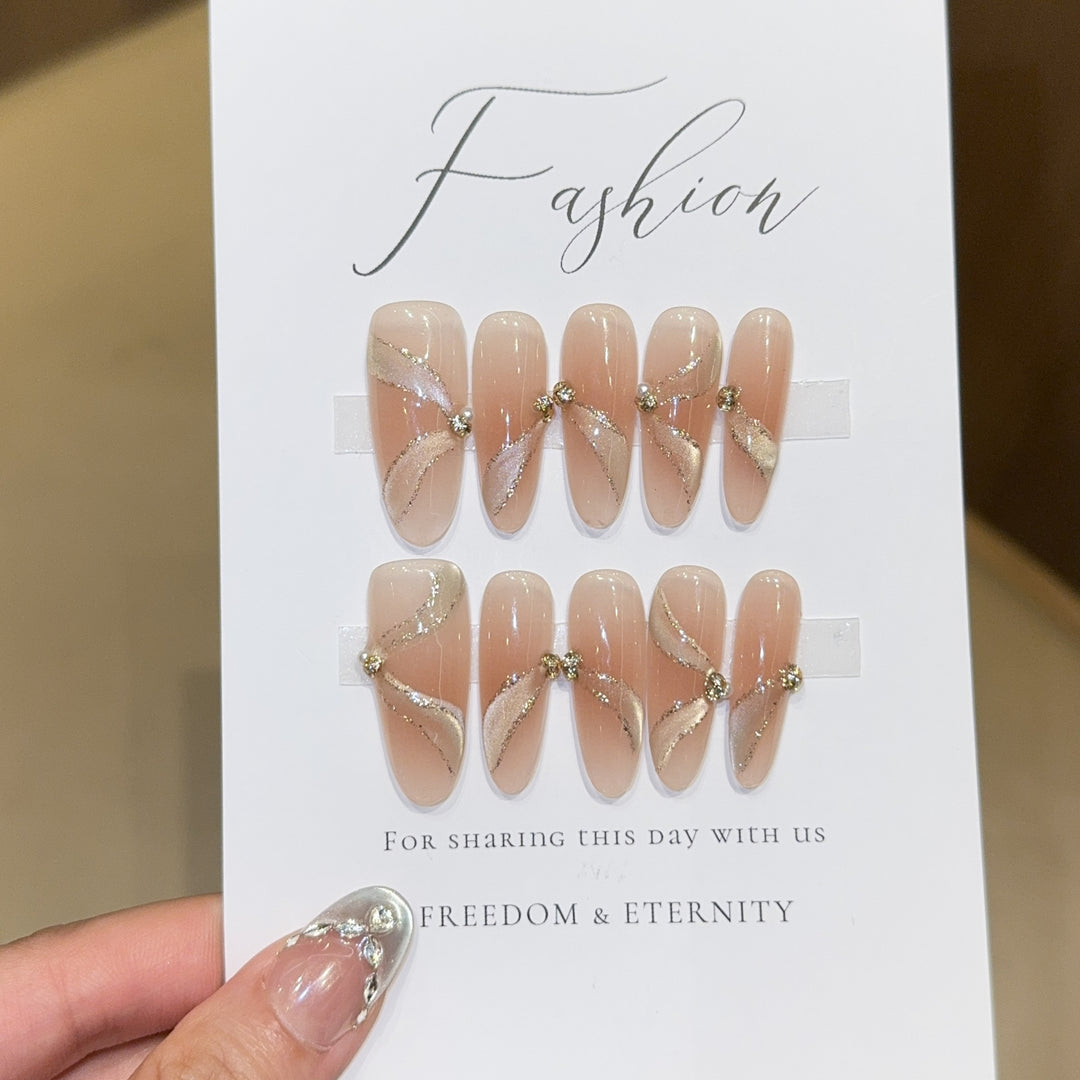 Artificial nails with elegant rhinestone accents Stornfield
