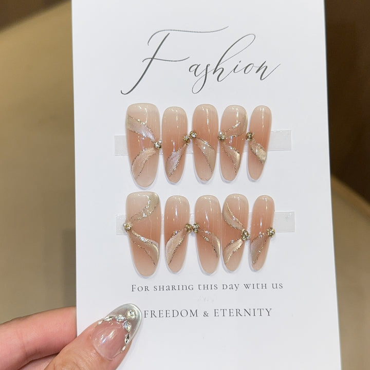 Artificial nails with elegant rhinestone accents Stornfield