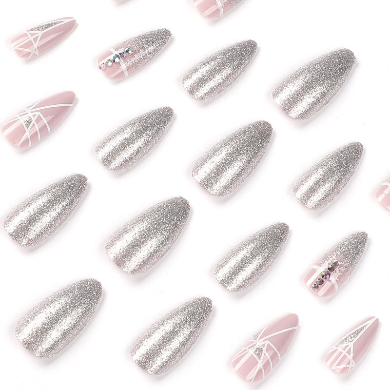 Artful nail extensions with glitter and geometric designs Stornfield