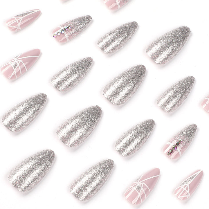 Artful nail extensions with glitter and geometric designs Stornfield