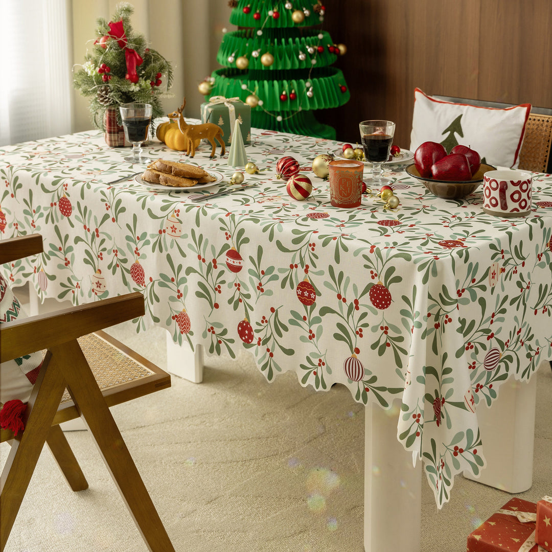 Festive tablecloth with wavy hem and mistletoe branch print