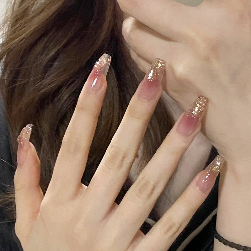 Artificial nails with glamorous glitter accents Stornfield