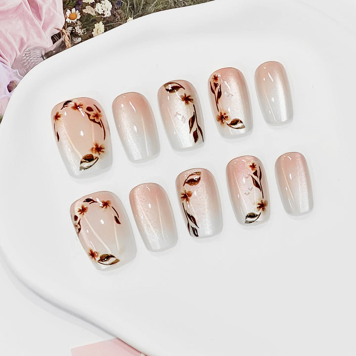 Artistic nail tips with floral accents Stornfield