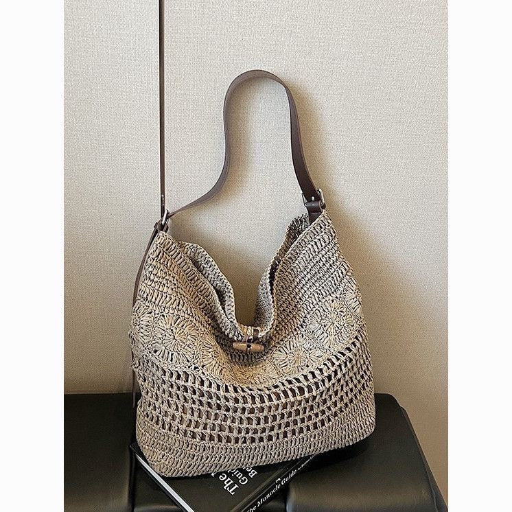 Braided summer handbag with practical leather handles Stornfield