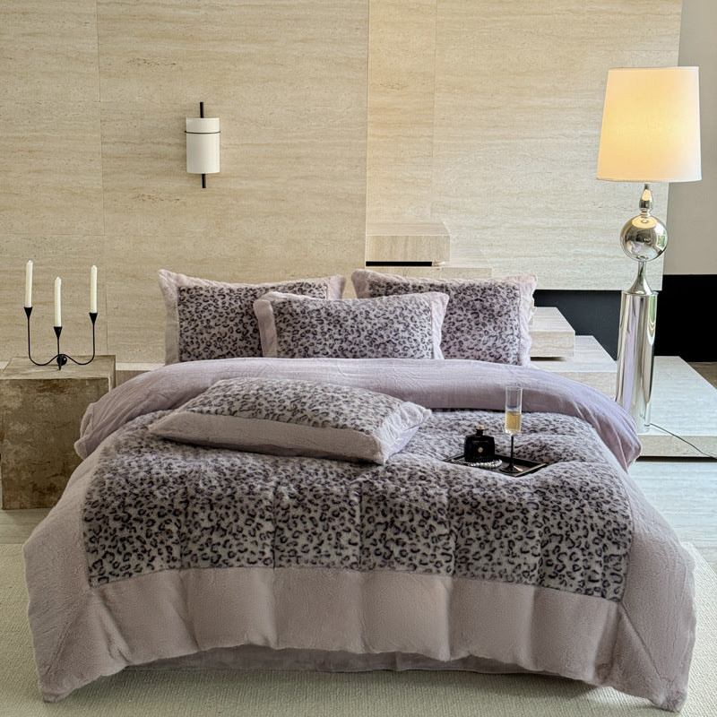 Plush bedding set with leopard faux fur and reversible function
