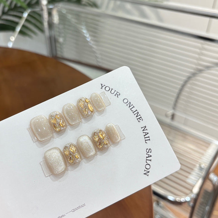 Artifical nail tips with glitter and rhinestones Stornfield
