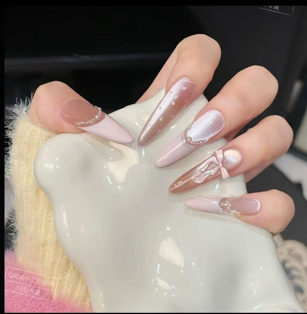 Glamorous artificial nail tips with elegant decorations Stornfield