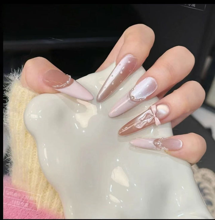 Glamorous artificial nail tips with elegant decorations Stornfield