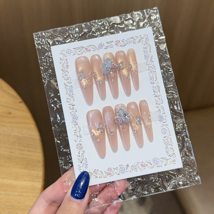 Artificial nails with romantic floral and glitter details Stornfield