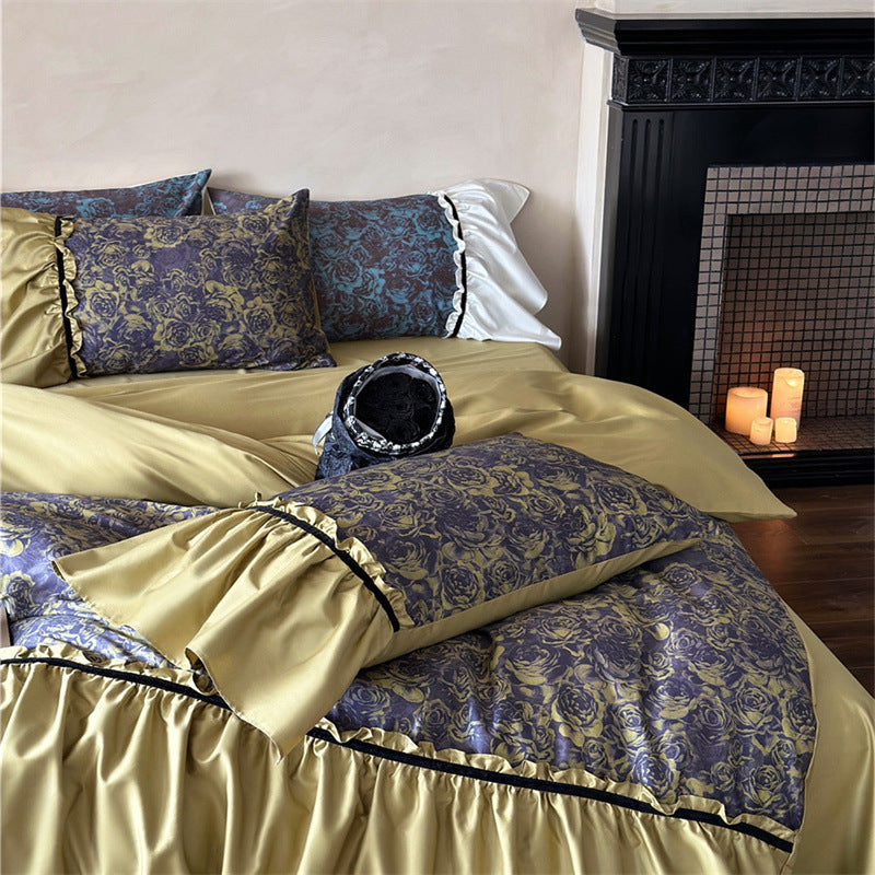 Reversible luxury bedding set made of cotton satin with gathered ruffle, floral jacquard inner side and contrasting velvet piping