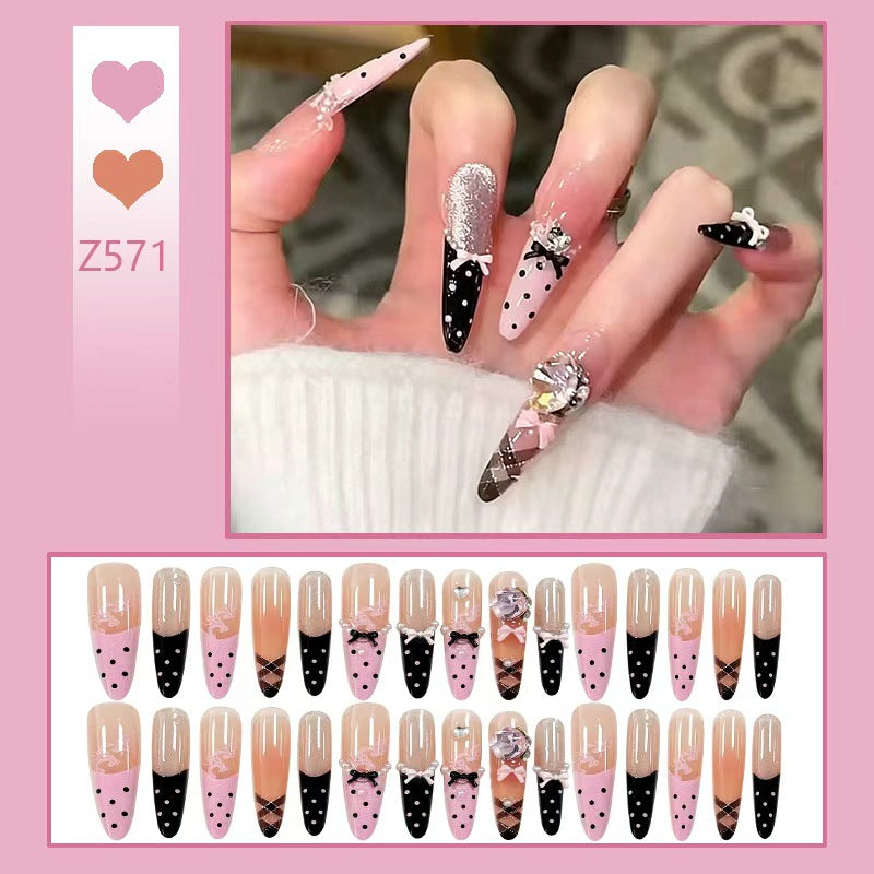Artificial nail set with glamorous 3D applications and festive design Stornfield