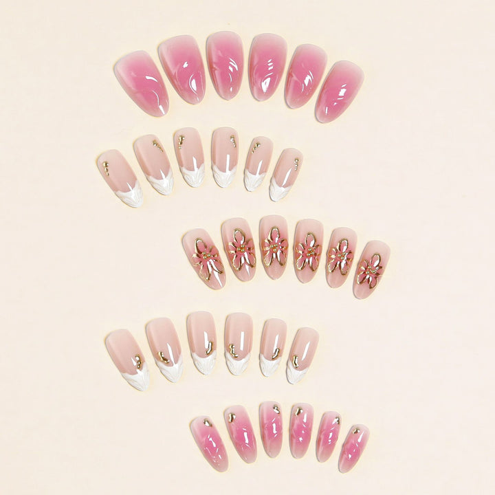 Artificial nails with floral design and glamorous accents Stornfield