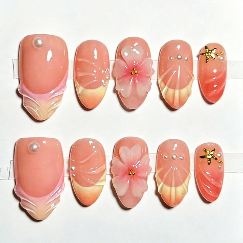 Artificial nail set with elegant floral decorations and luxurious shine Stornfield