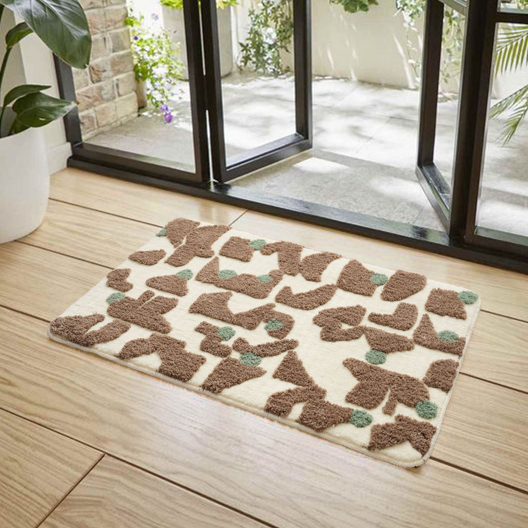Tufted bathroom mat in abstract leopard pattern with soft high pile Stornfield