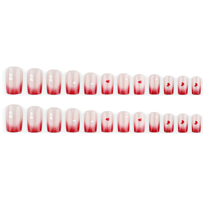 Romantic Nail Art with Heart Motifs Stornfield