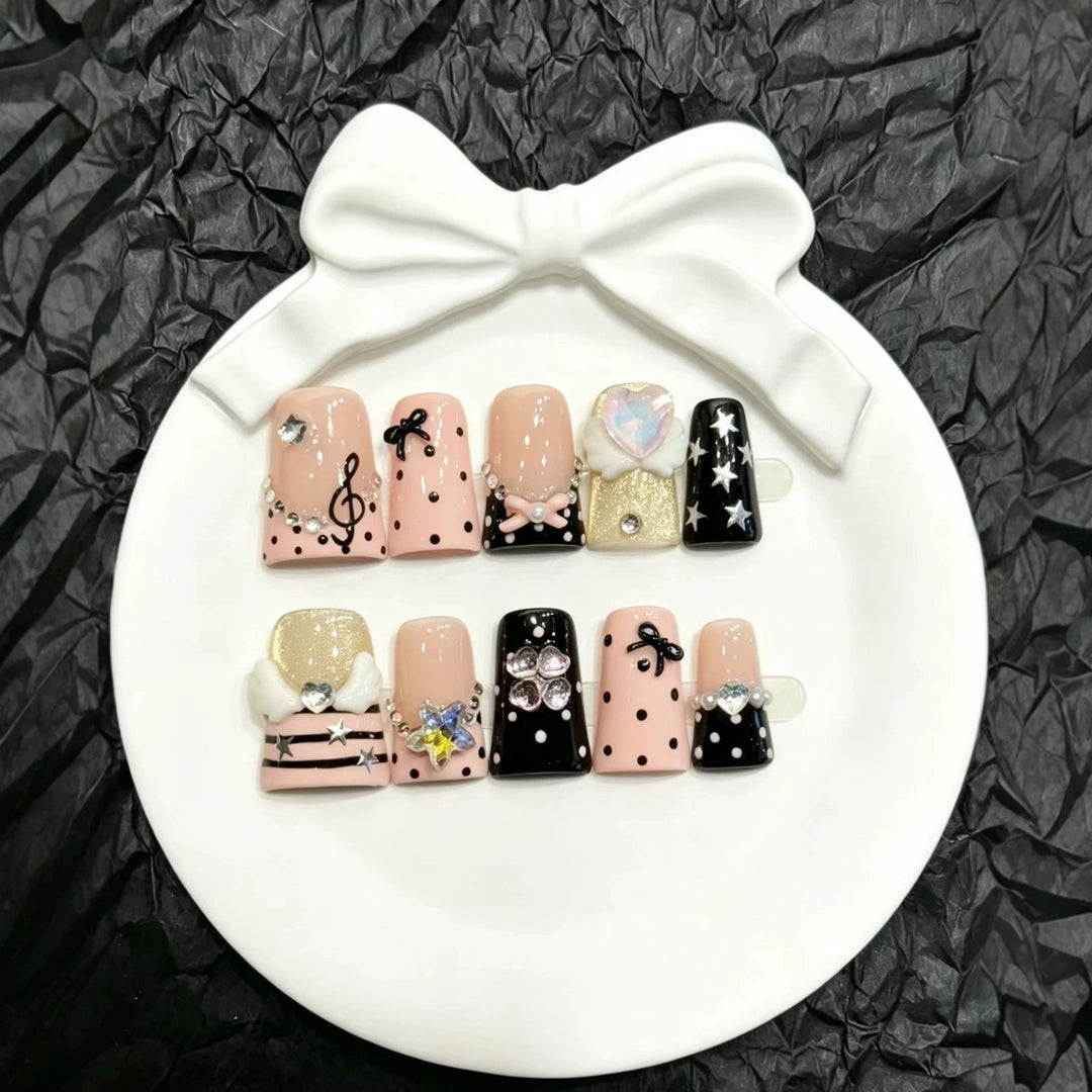 Decorative Press-On Nail Art Set with Unique Charms