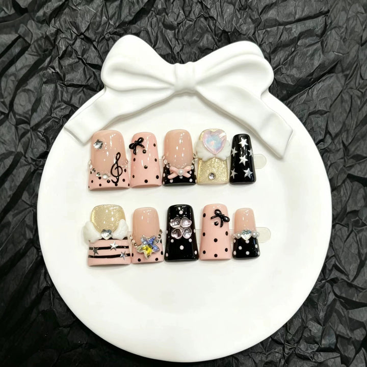 Decorative Press-On Nail Art Set with Unique Charms