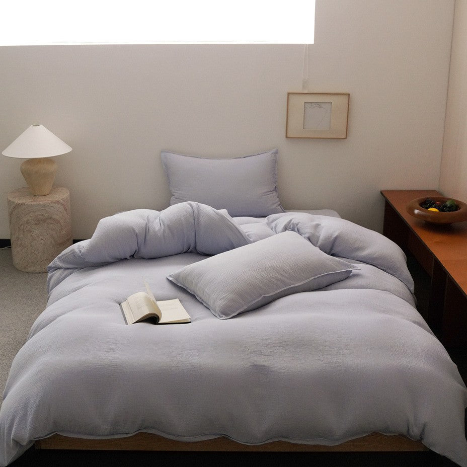 Checked cotton bedding set with soft percale texture and reversible pillowcases