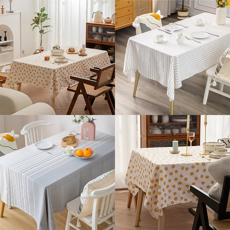Rectangular tablecloth made of cotton blend fabric with gold dot print