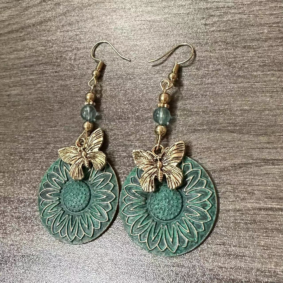 Elegant earrings with floral motif and butterflies Stornfield